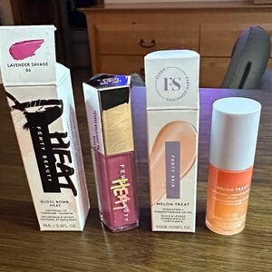 Fenty Beauty Gloss Bomb Heat in Lavender Savage and Melon Treat Lip Oil.